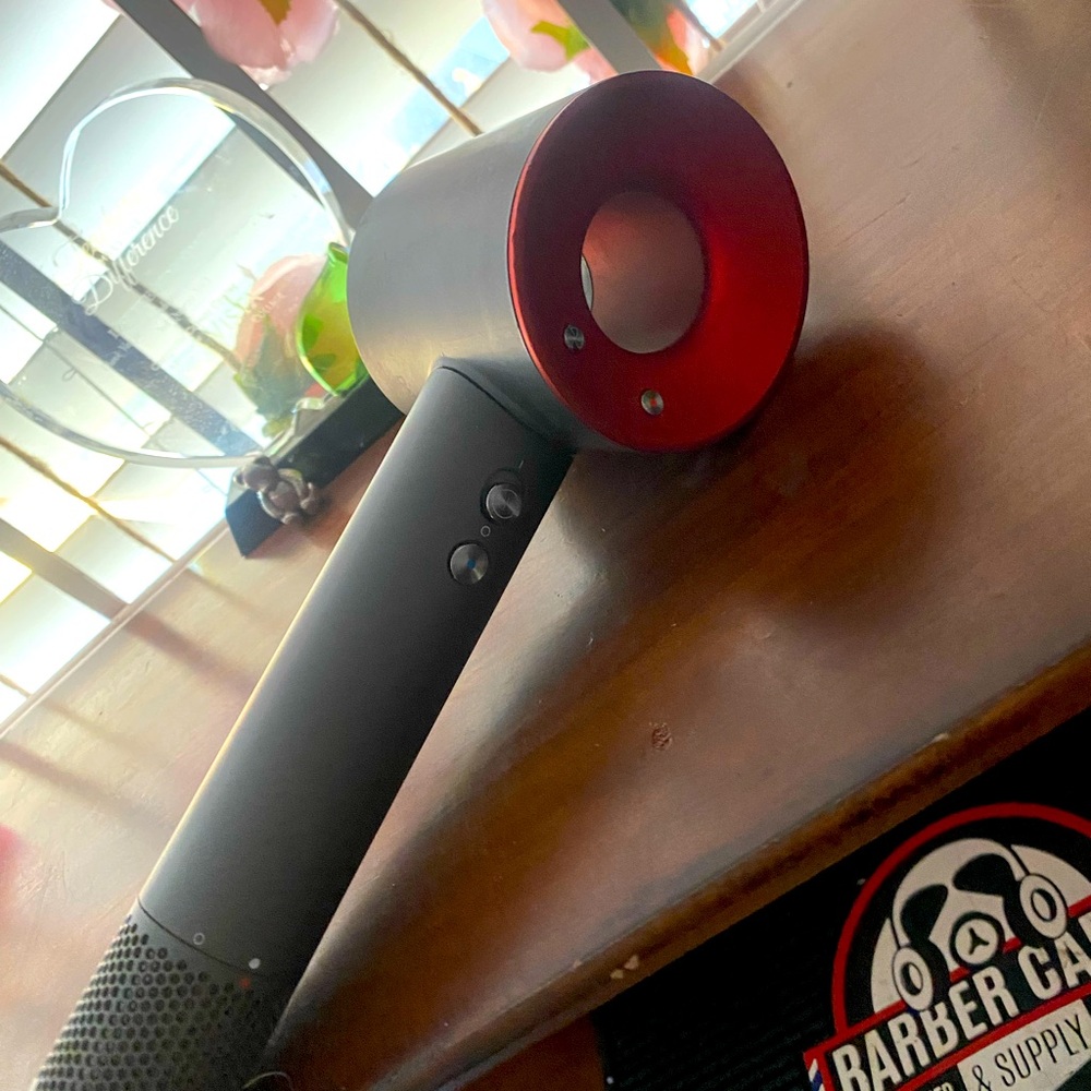 Red Dyson Hair dryer